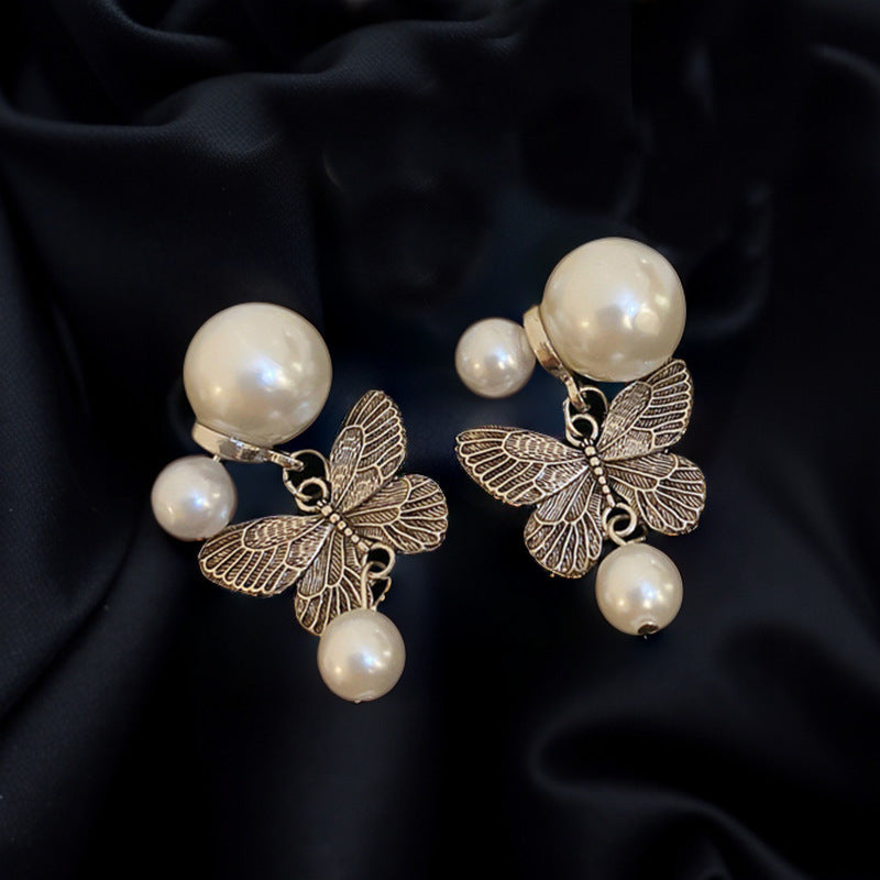 Discover Timeless Elegance: Vintage Butterfly Pearl Stud Earrings Style!