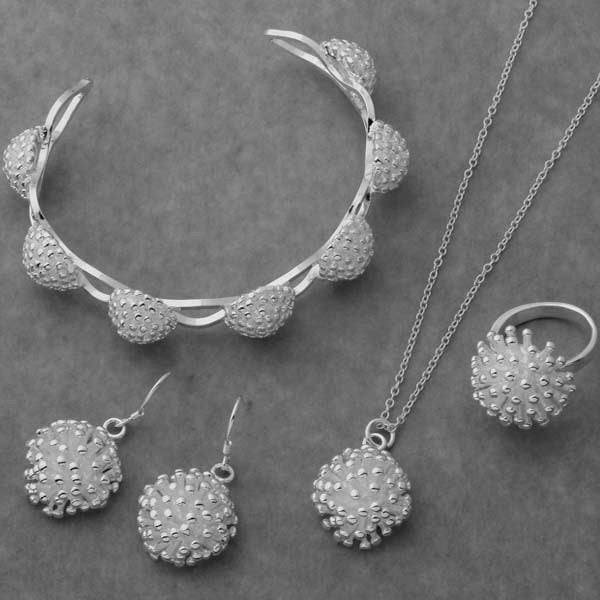 Stunning Jewelry Set: Bracelet, Pendant Necklace, Ring, and Earrings