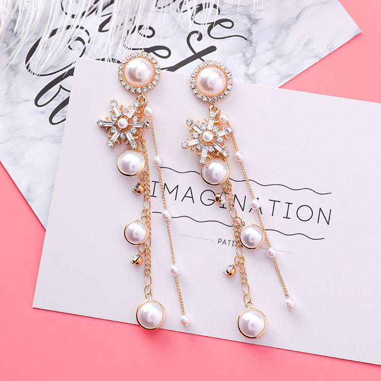 Sparkle and Shine: Long Chain Crystal Snowflake Pearl Earrings