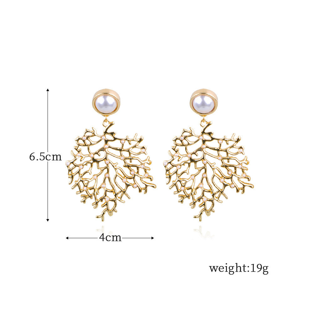 Boucles d'oreilles élégantes en forme de corail : sublimez votre style avec une beauté unique