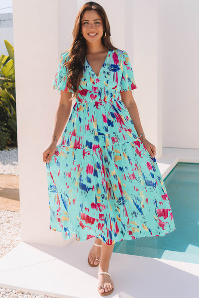 Abstract print maxi dress flatters figure with chic style