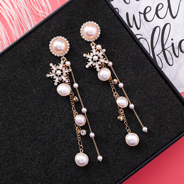 Sparkle and Shine: Long Chain Crystal Snowflake Pearl Earrings