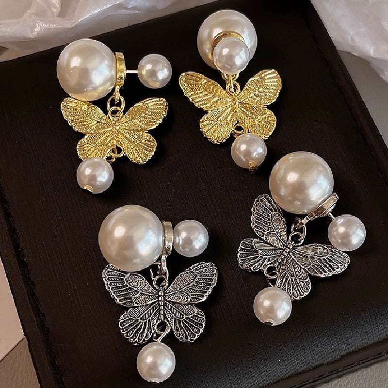 Discover Timeless Elegance: Vintage Butterfly Pearl Stud Earrings Style!