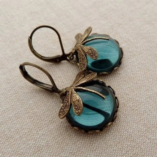 Timeless Beauty: Moonstone Earrings Featuring Hanging Vintage Dragonfly Pendant Design