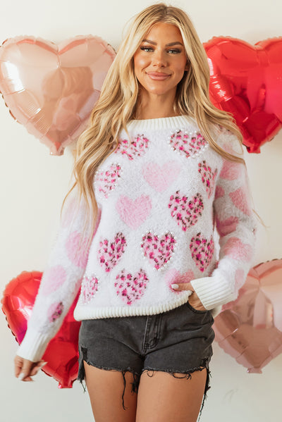 Cozy Heart Leopard Print Sweater keeps you stylish warm.