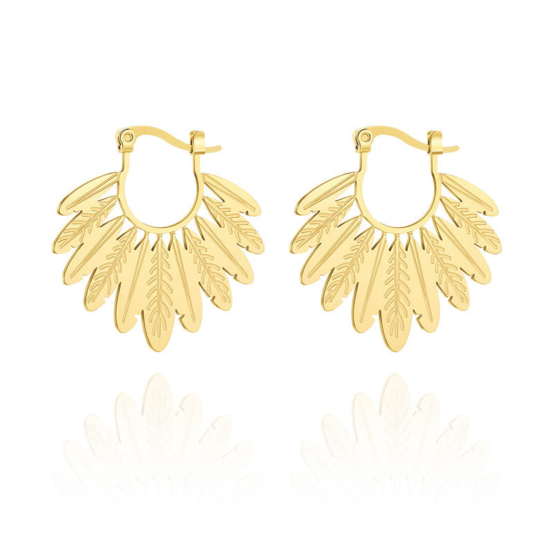 Boucles d'oreilles élégantes en acier titane en forme de feuille : accessoire parfait pour toutes les occasions.