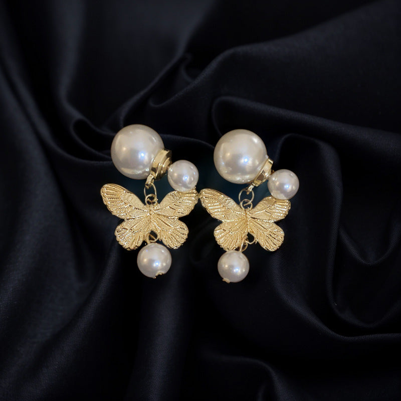 Discover Timeless Elegance: Vintage Butterfly Pearl Stud Earrings Style!