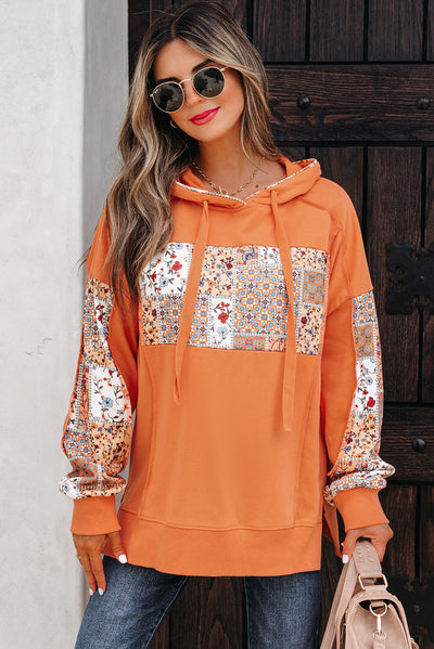 Stylish floral patchwork hoodie offers comfort and versatility